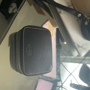 Coach black pill case